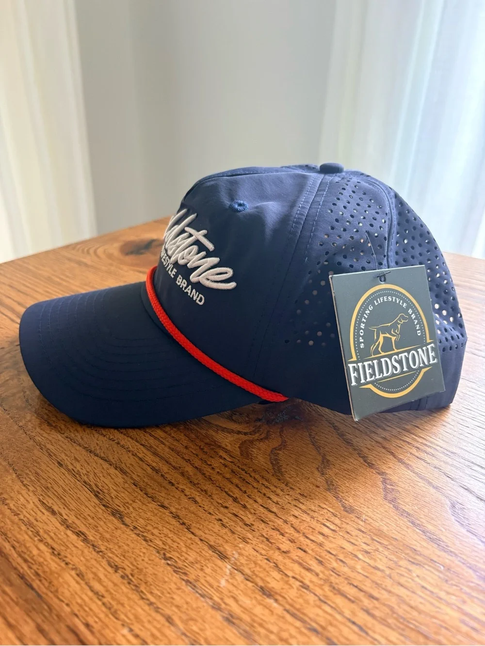 New with tags Fieldstone Navy hat with Red Accent - mens- SnapBack